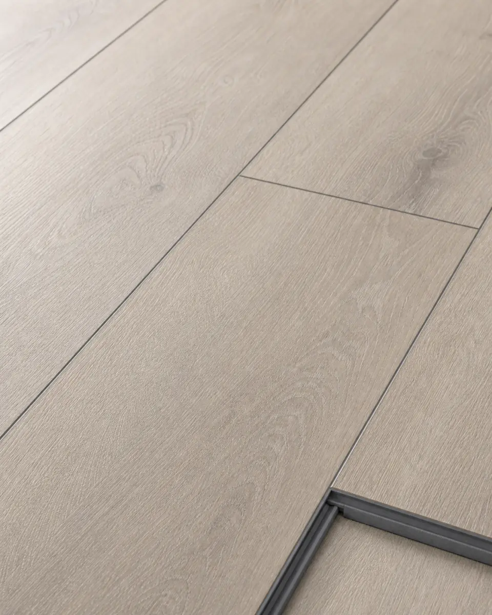 Waterproof luxury vinyl plank flooring surface with realistic wood grain, tall detail