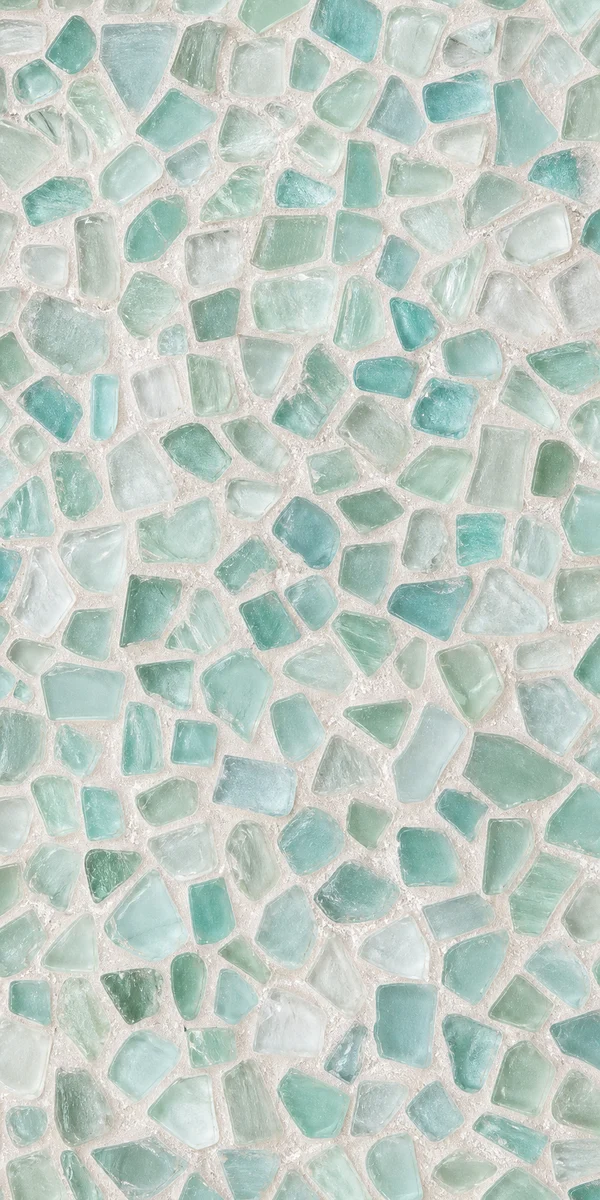 Sea-glass mosaic tile in soft aqua tones, close detail